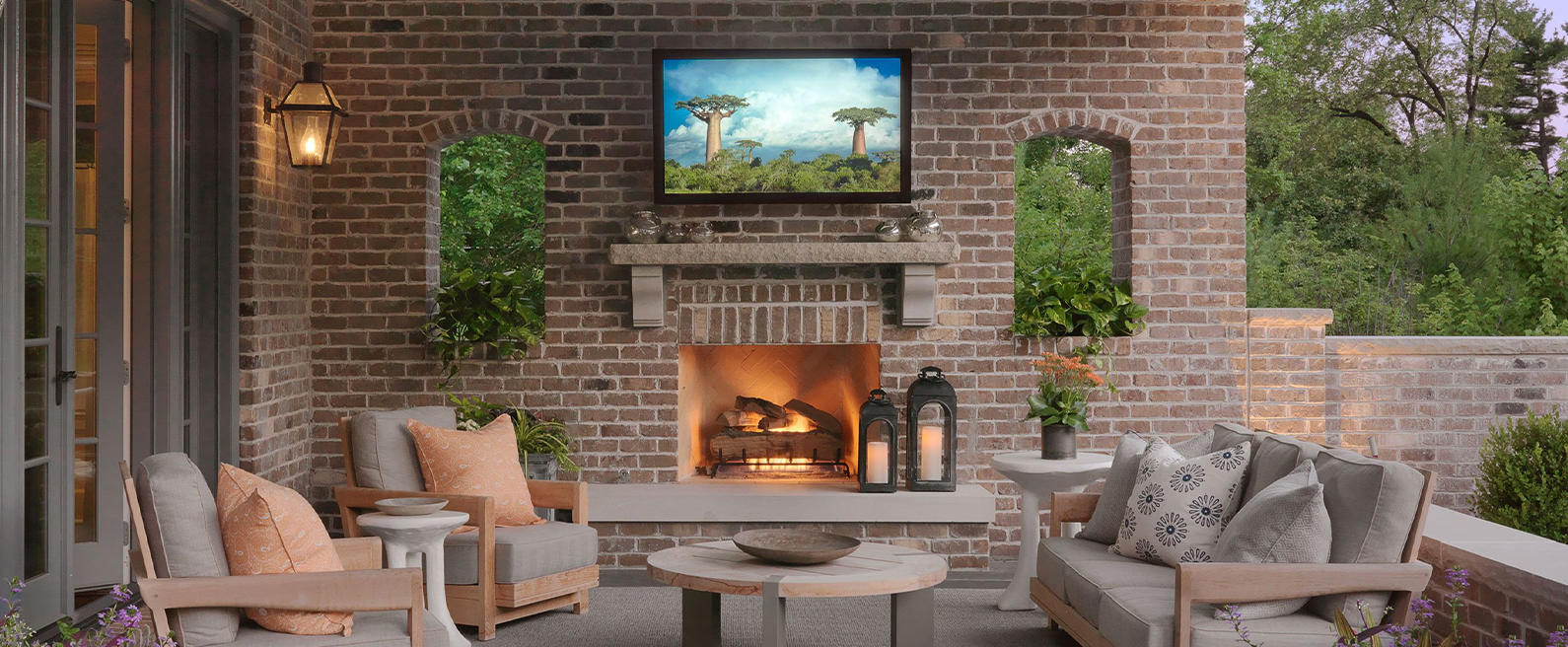 Residential outside lounge with tv and fireplace